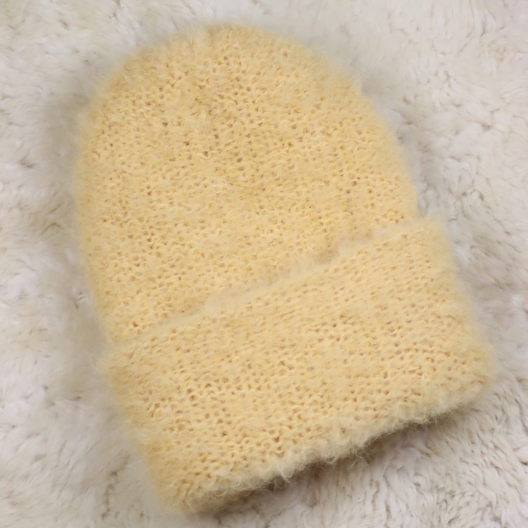 Keeratava äärega karvane müts - Puffy