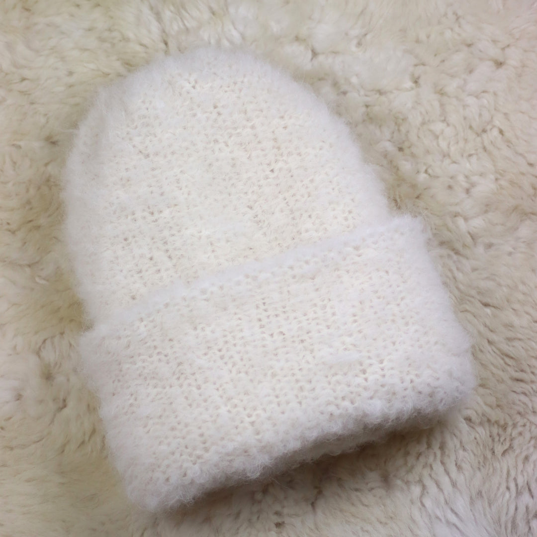Keeratava äärega karvane müts - Puffy