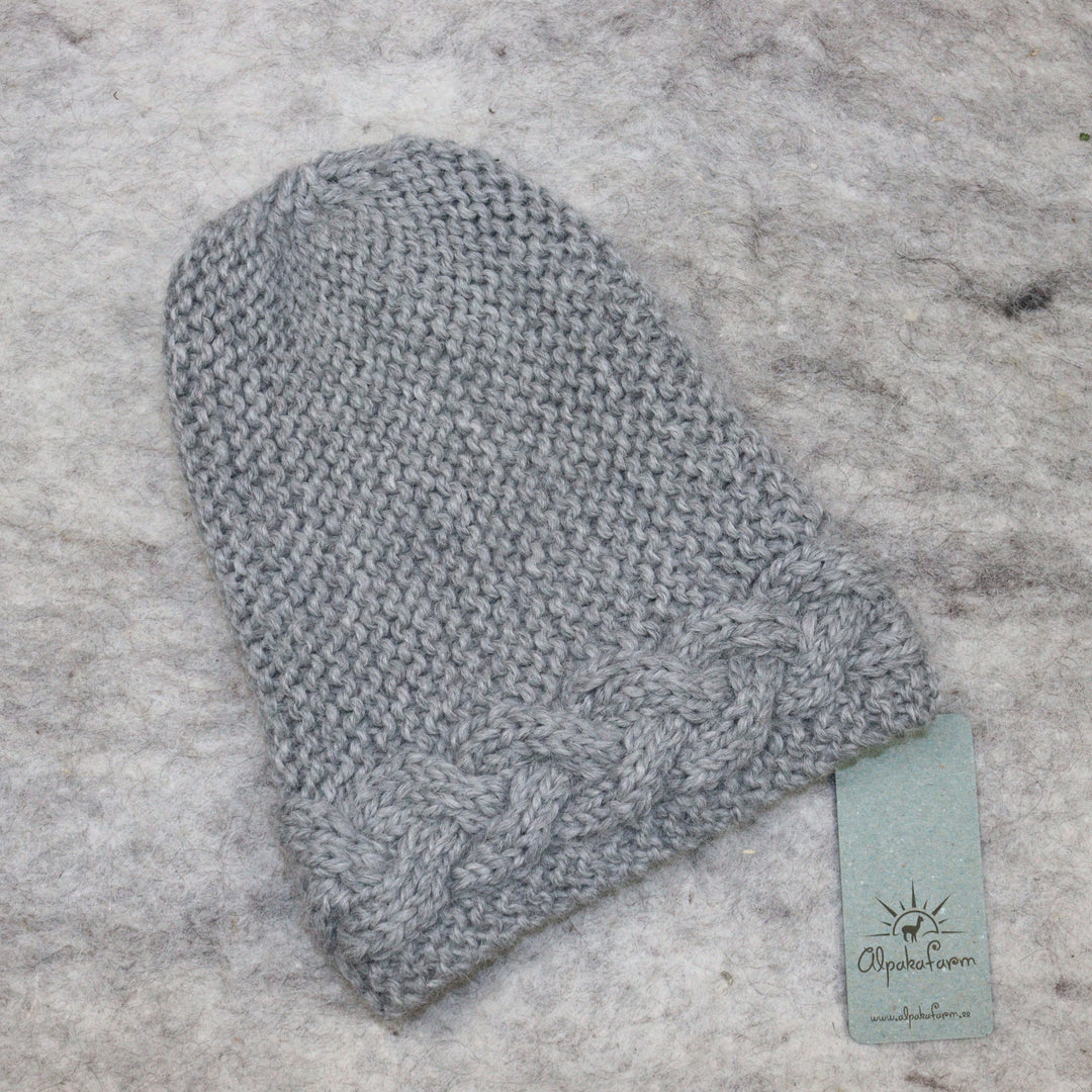 Palmikuäärega müts